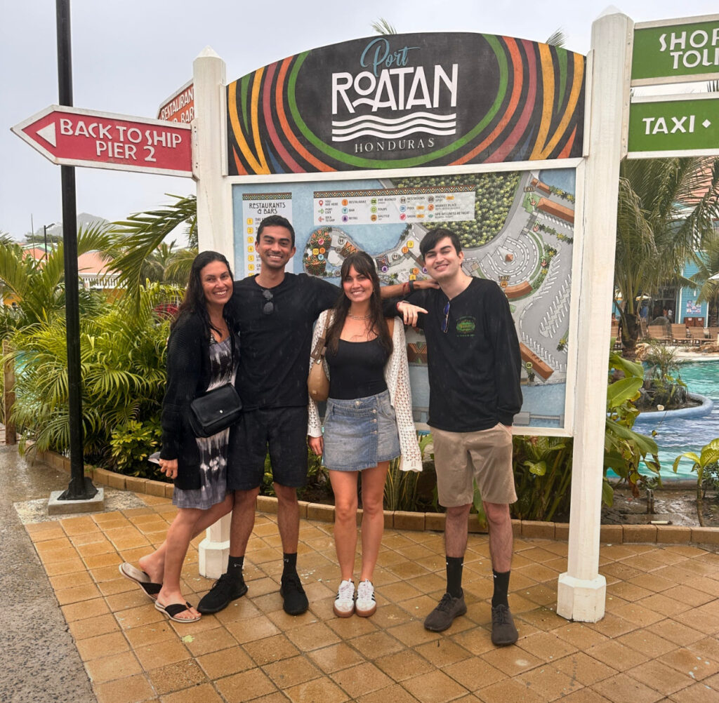 Family exploring a local market together during a trip